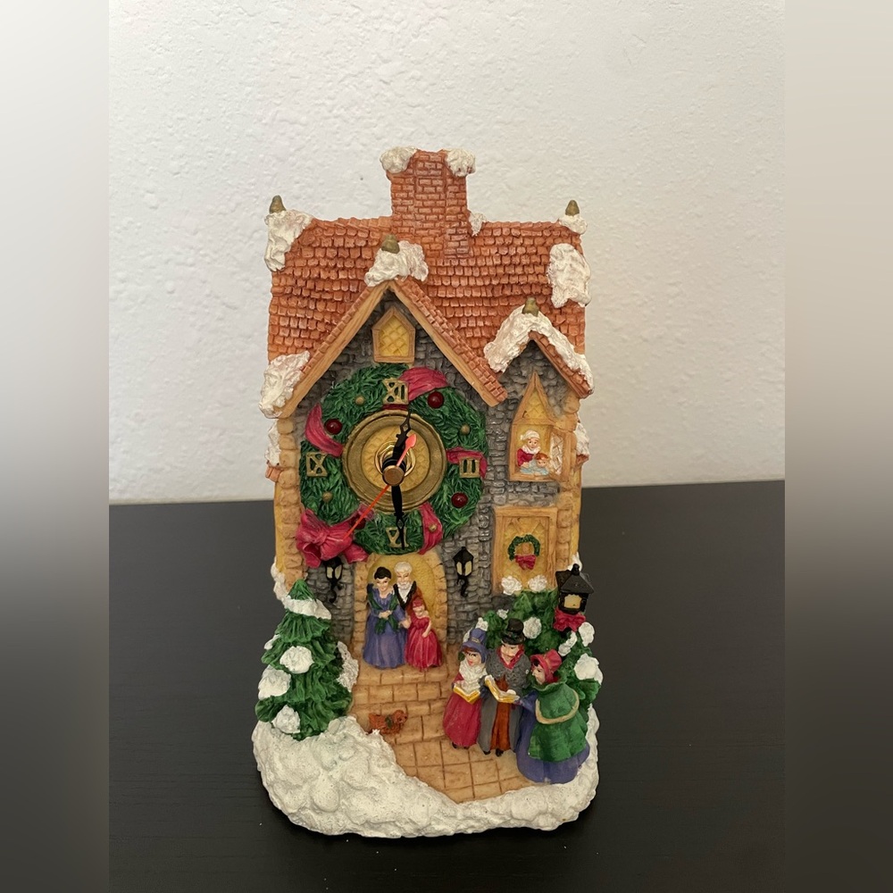 Rich Art Co. stand up Clock, Dickens Christmas design Lights/music.